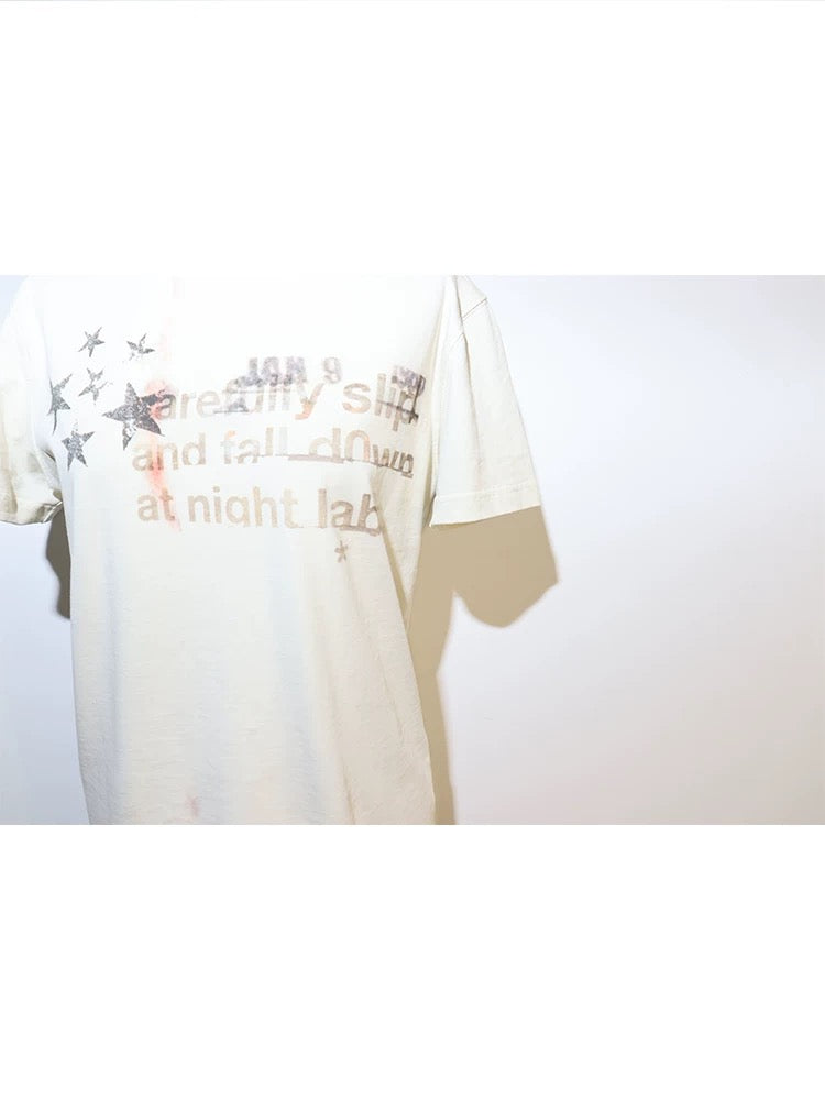 ディストーションスター ホワイトプリント アプリコット Tシャツ