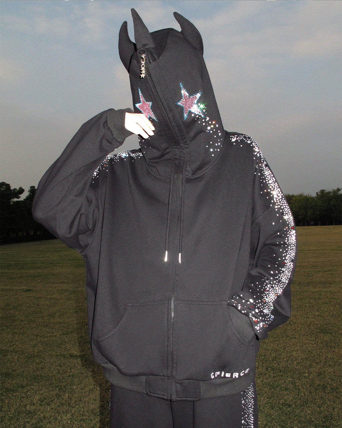 CFIERCE Crying Unicorn Rhinestone Zip Hoodie - black horned rhinestone zip hoodie worn front close-up