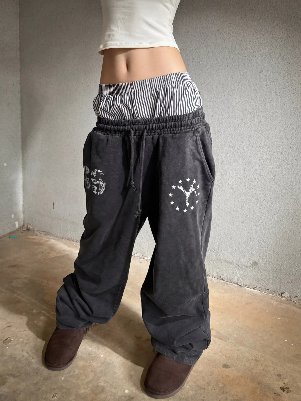 Washed Double Waistband Distressed Print Sweatpants - Washed Black on model front