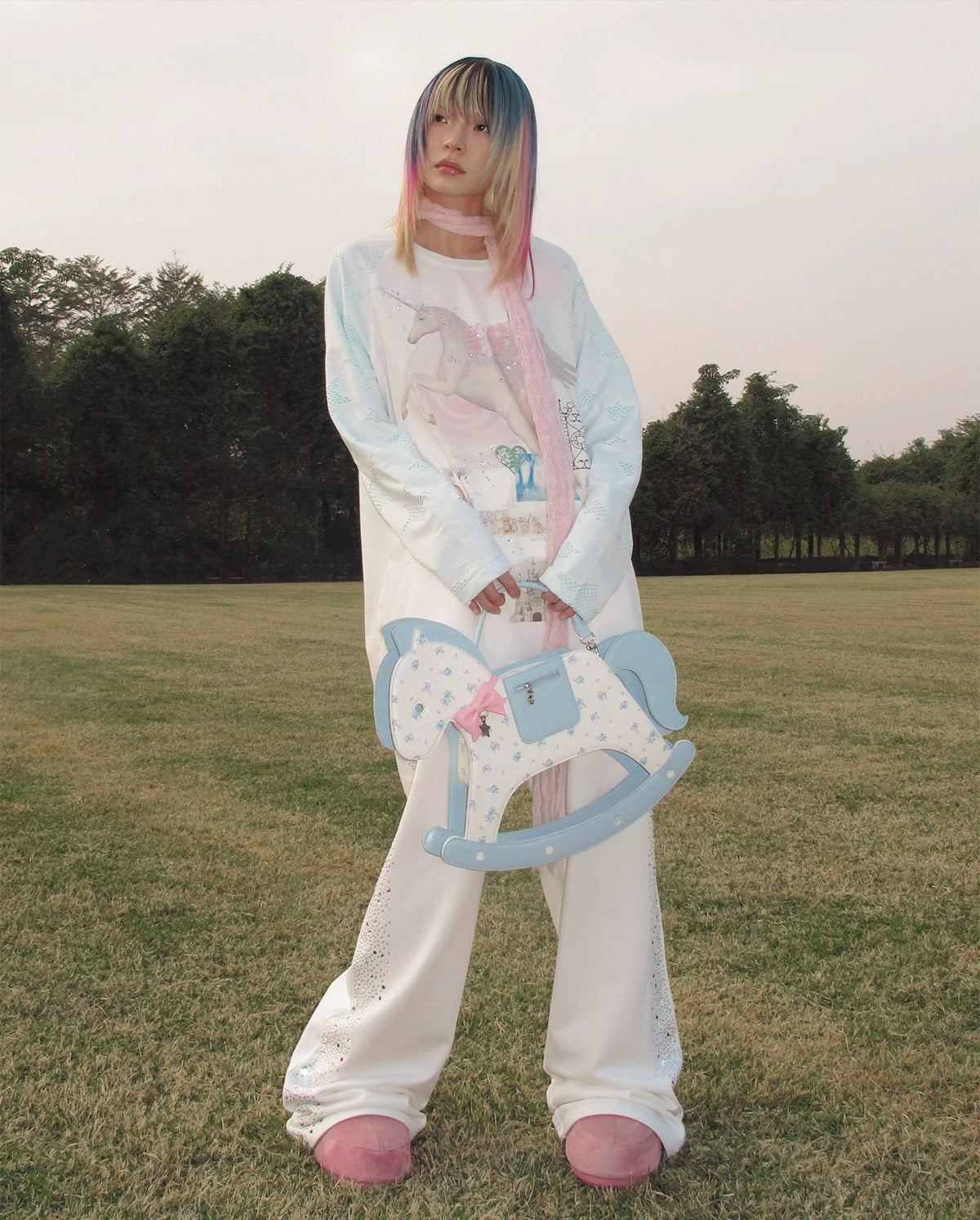 CFIERCE Rocking Horse Crossbody Handbag - blue floral rocking-horse handbag worn with white look