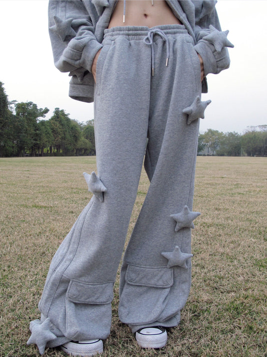 CFIERCE Raised Star Flared Sweatpants - gray raised-star flared sweatpants worn close front