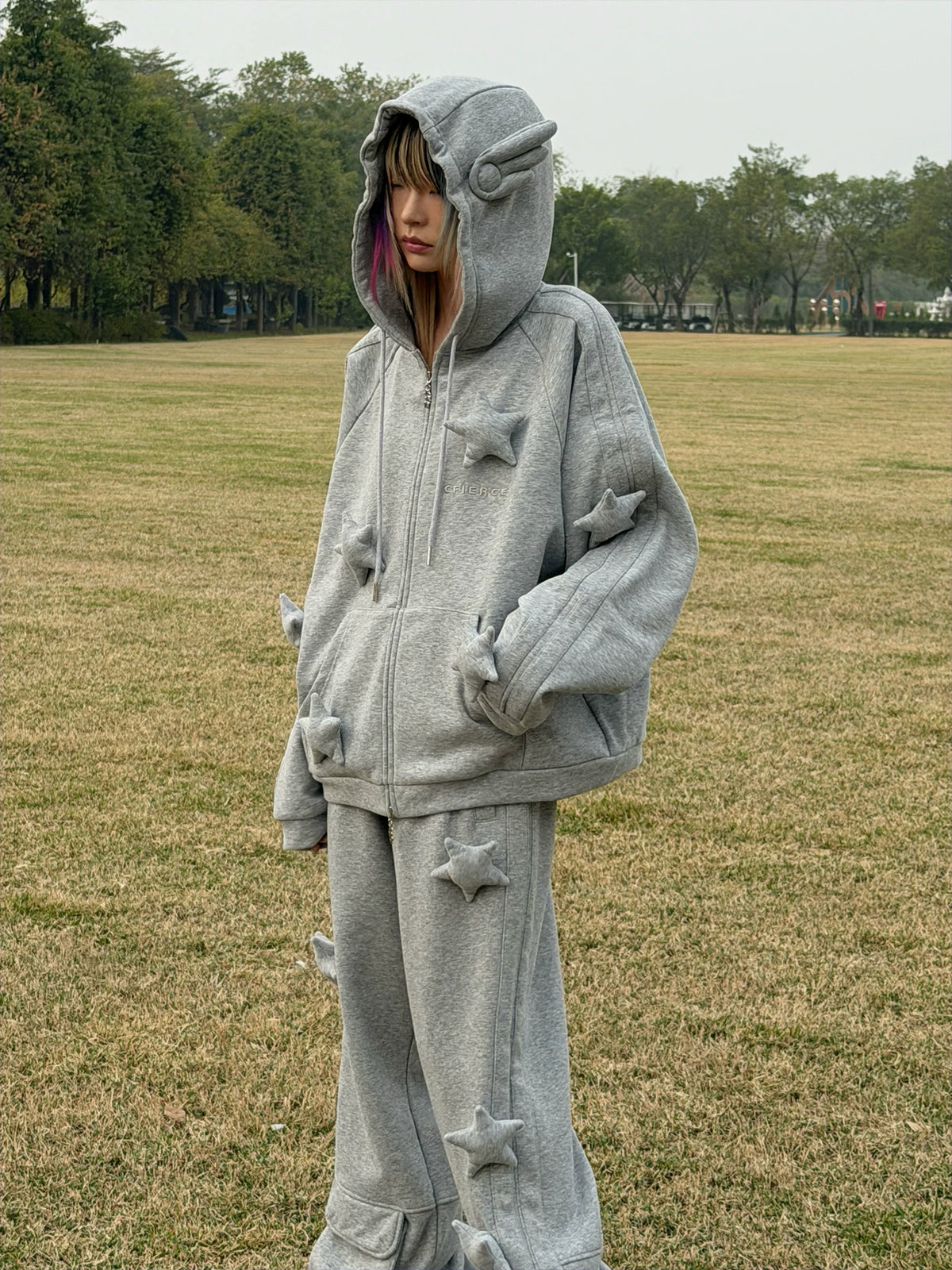 CFIERCE Raised Star Flared Sweatpants - gray raised-star flared sweatpants worn outdoors side