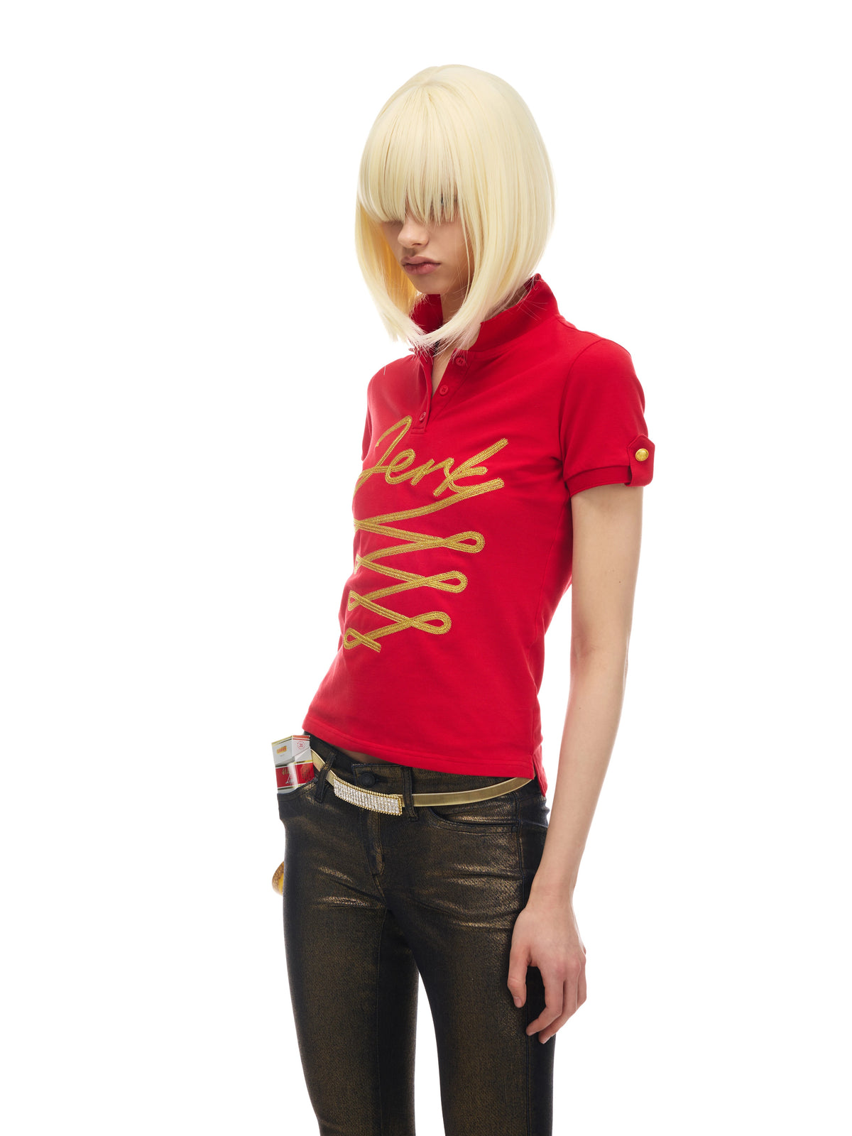 NORGIRA Red Jerk Gold-Embroidered Polo Shirt - red gold embroidered polo on model, front side view; shoulder epaulette is styling prop