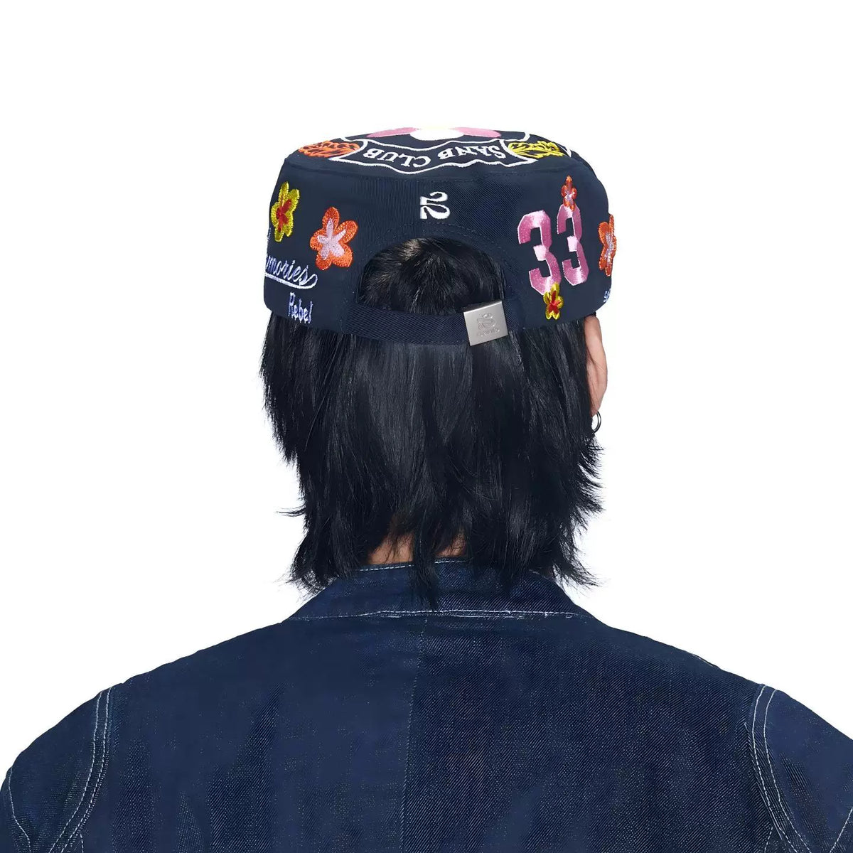 SANB Hwa navy embroidered cap on model, adjustable back view