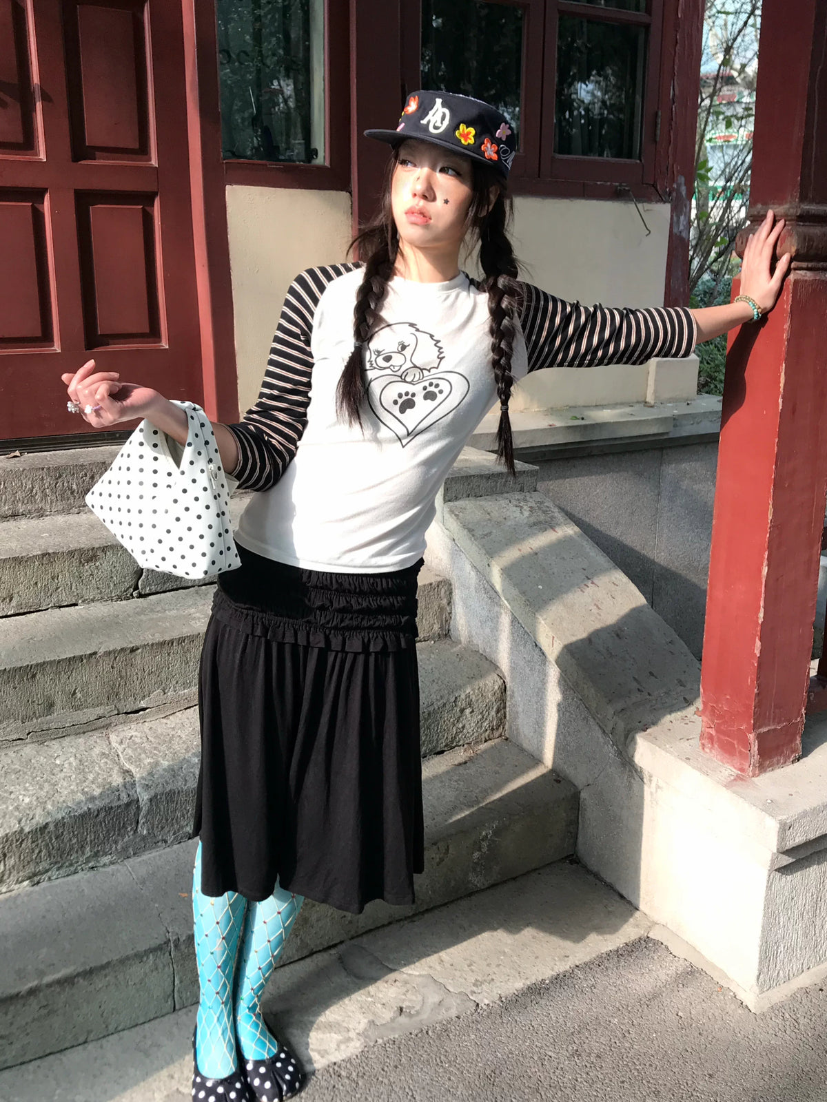 SANB Hwa cap worn with streetwear, full-length view
