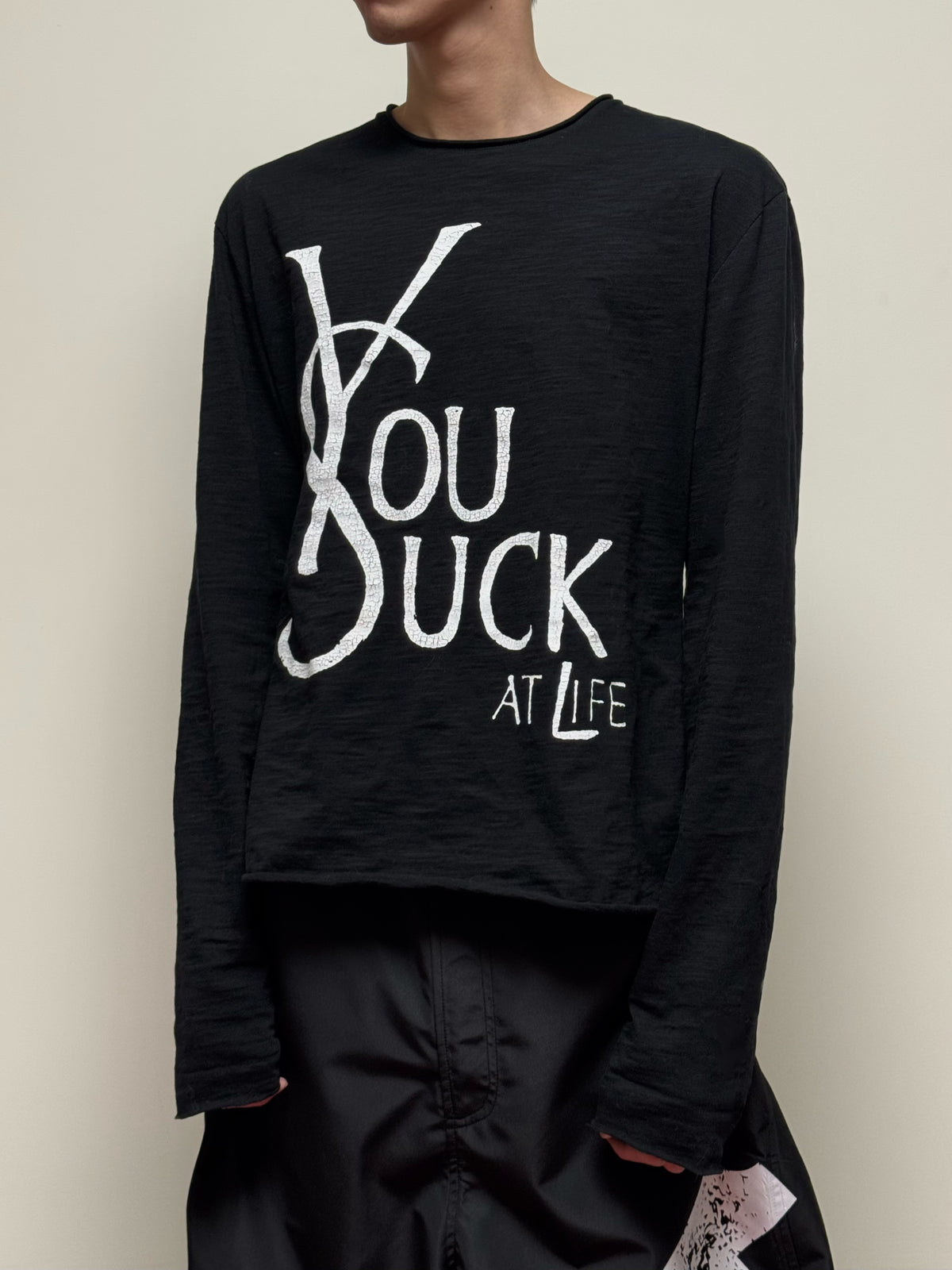 You Suck At Life Crackle Print Long Sleeve Tee - Black front