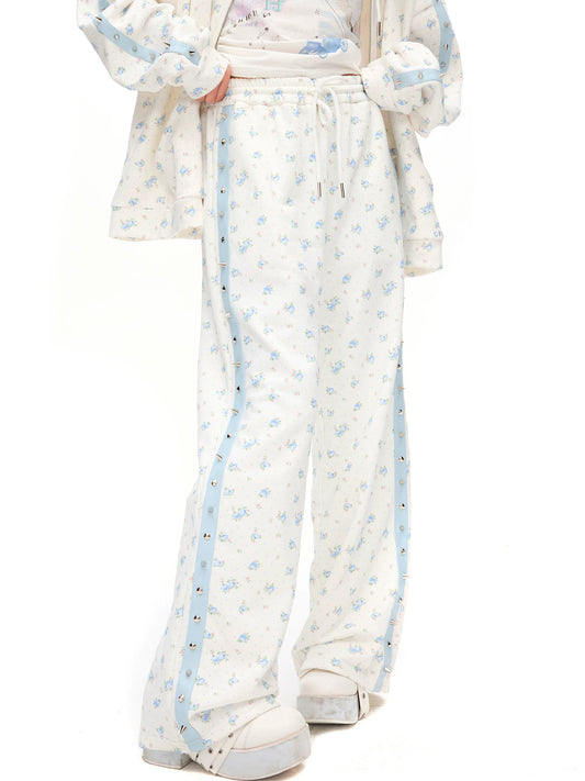 CFIERCE Blue Rose Studded-Stripe Sweatpants - blue floral print and side studs on model