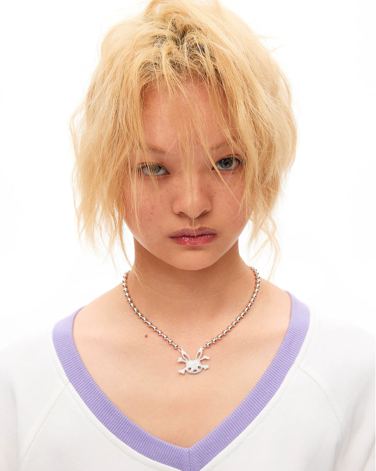 CFIERCE Rhinestone Bunny Skull Mini Necklace - white bunny-skull necklace close view on model
