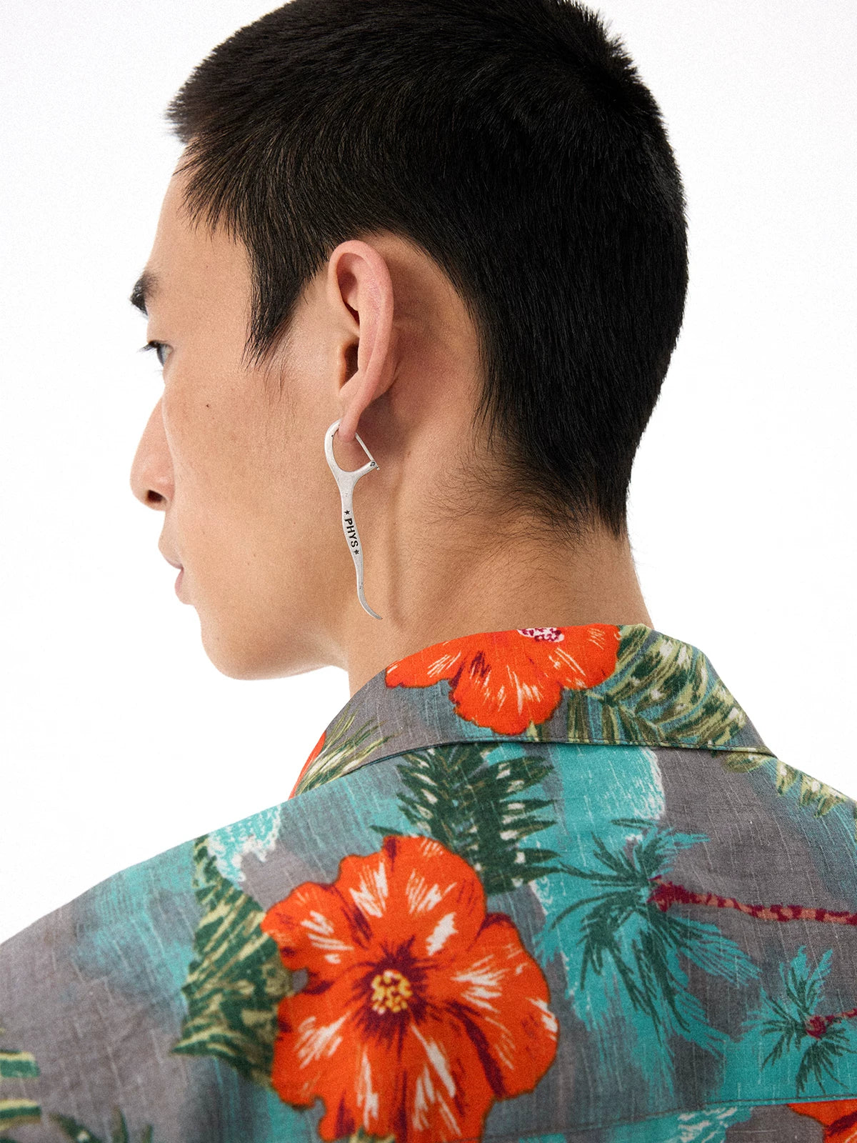 Distressed Dental Floss Pick Earrings - Male model side view
