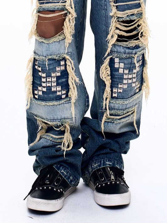 Fourth3ex Studded Double Zip Mid-Top Sneakers - Black worn with distressed jeans - front