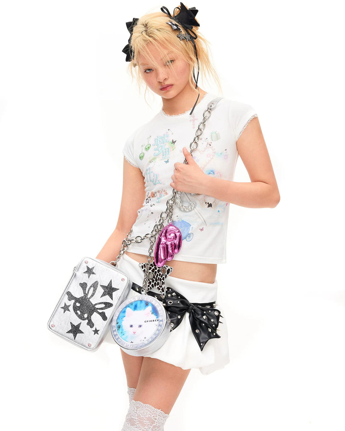 CFIERCE Studded Bow Bubble Mini Skirt - white bubble skirt with black bow worn with crossbody bag