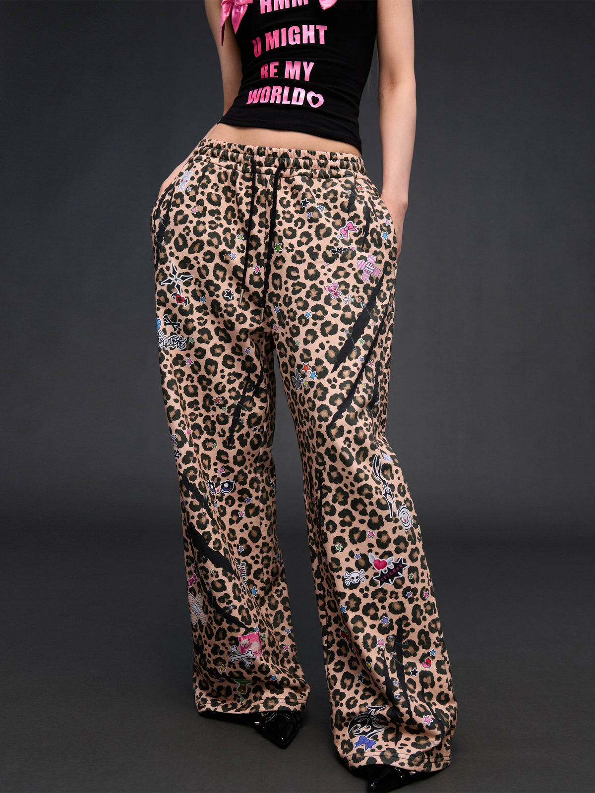 CFIERCE Leopard Sticker Print Wide-Leg Sweatpants - print detail worn by model
