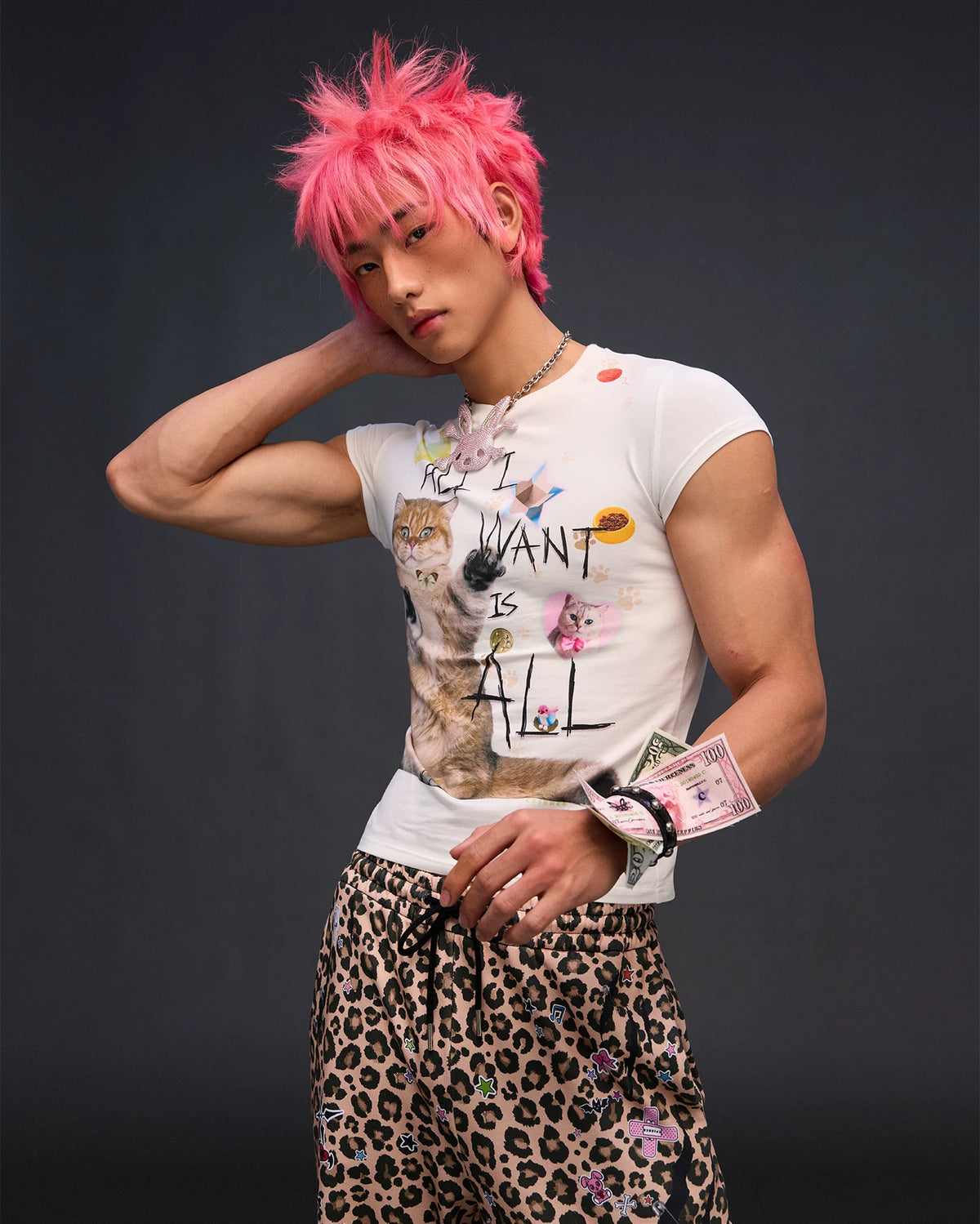 CFIERCE Money Print Studded Bracelet - money-print bracelet shown on wrist close to model face