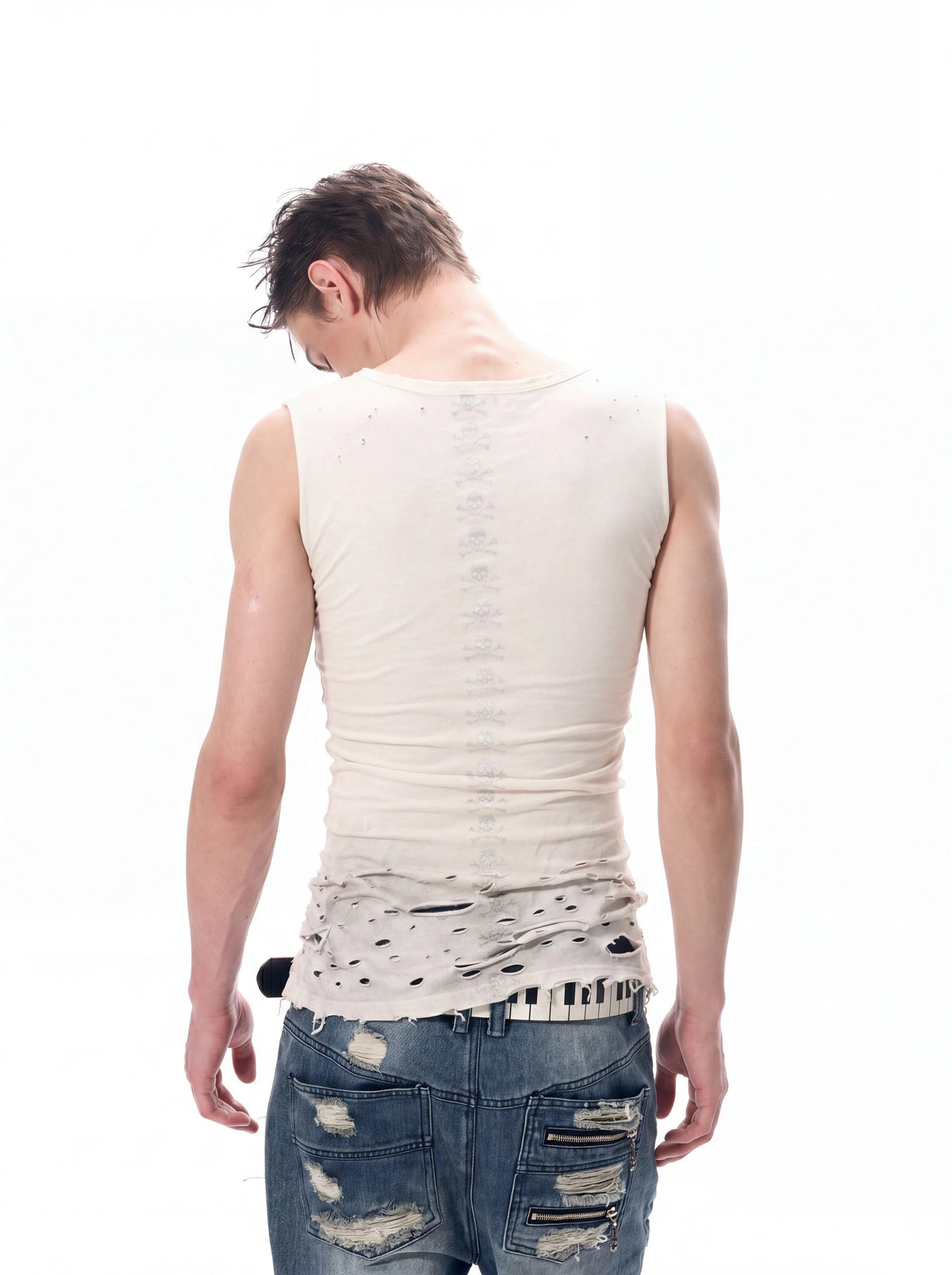 Back view of white tank with tonal vertical skull print