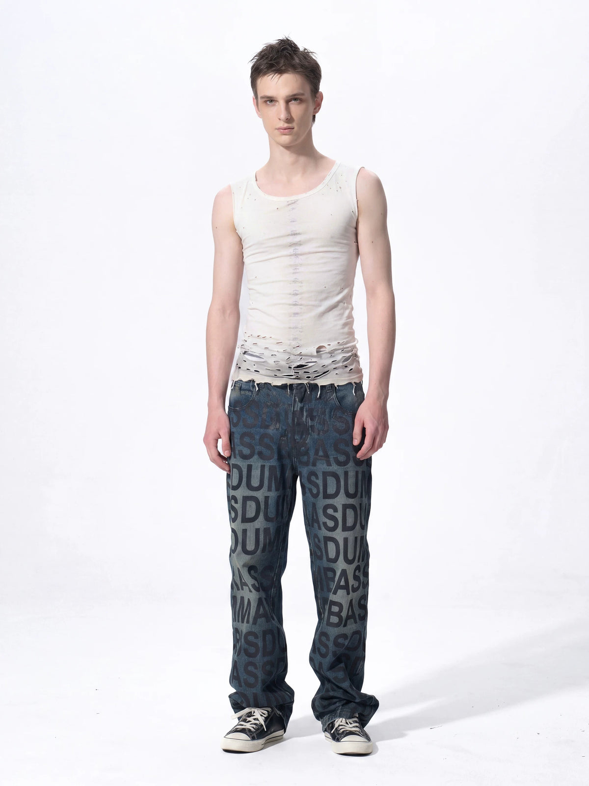 Full outfit showing white distressed sleeveless tank