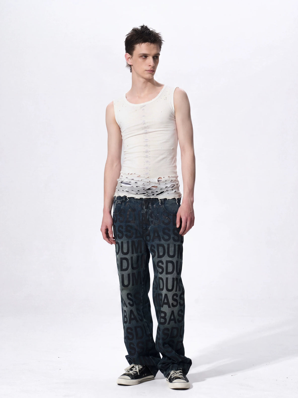 Angled outfit with white sleeveless skull-print tank