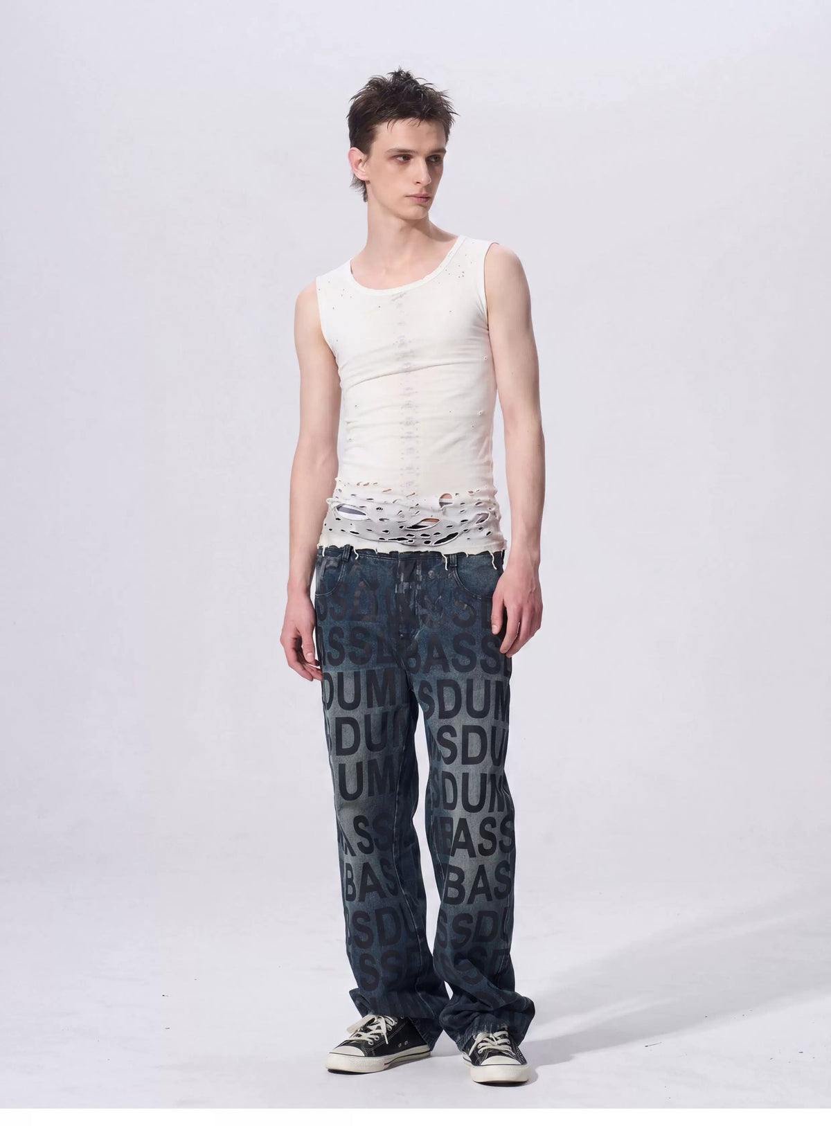 Angled front view of white distressed tank