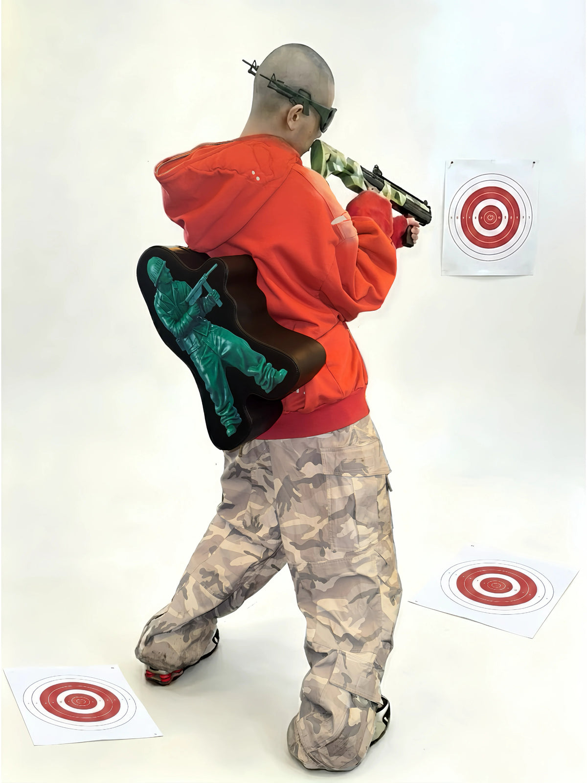 IV MATIC 3D Toy Soldier Backpack - side view worn by model
