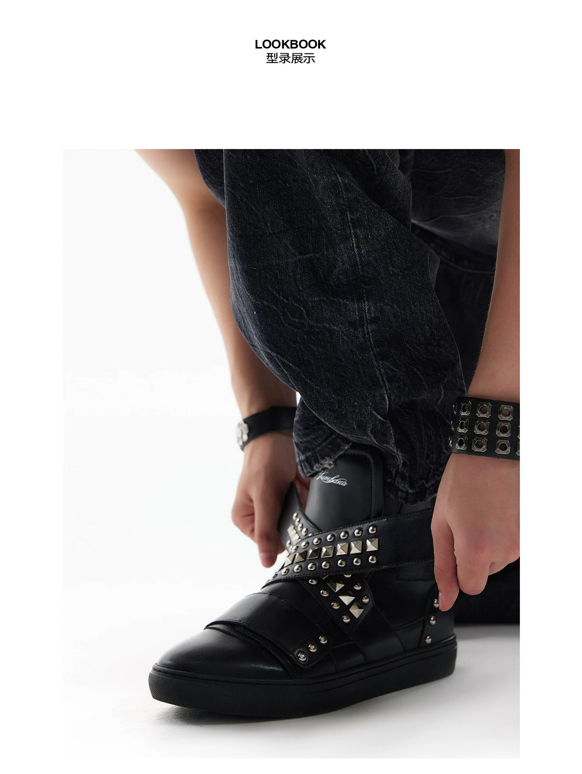 NumbAsia Studded Multi-Strap High-Top Sneakers - black shoe worn close-up