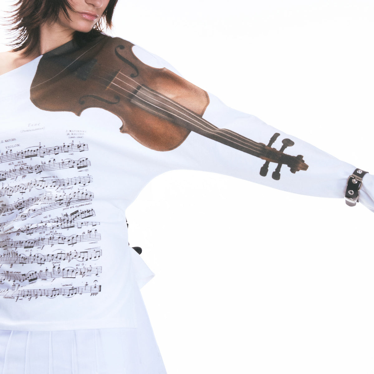 Close-up of violin and sheet-music print