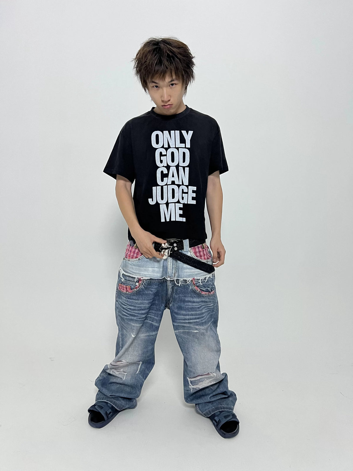 Only God Can Judge Me Washed Distressed T-Shirt - Black model full-length view with jeans