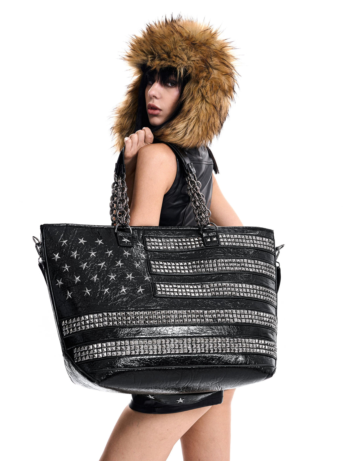 SEE Studded American Flag Oversized Tote Bag - carried on model