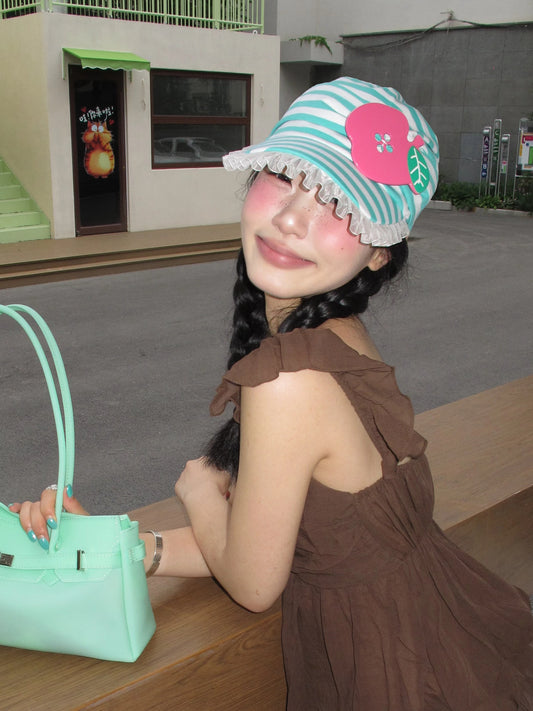 SANB Tulle Apple Stripe Cotton Cap - side on model outdoors