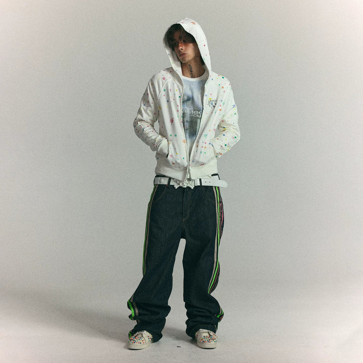 Colorful polka dot hoodie styled on model