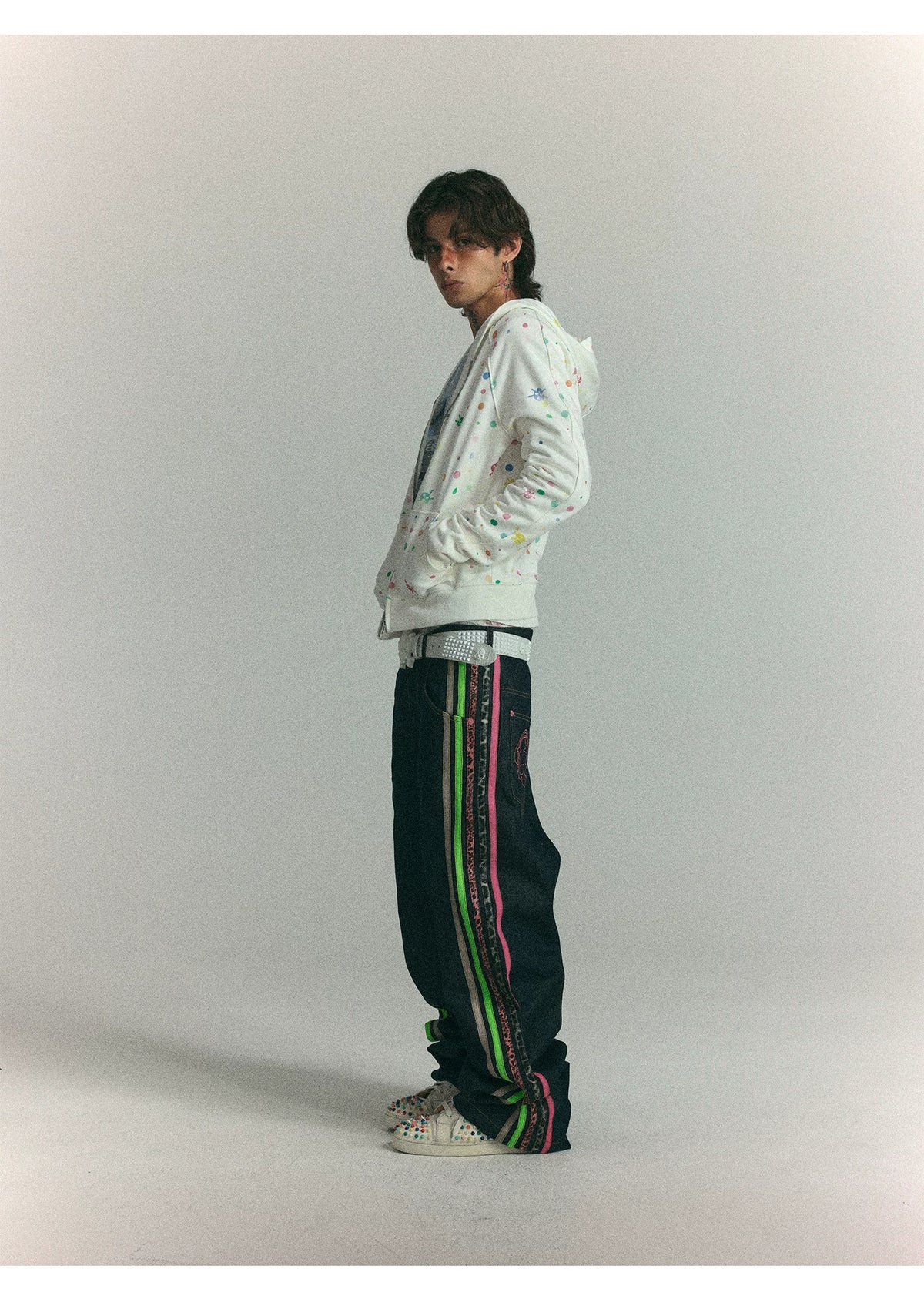 Colorful polka dot zip hoodie side on model