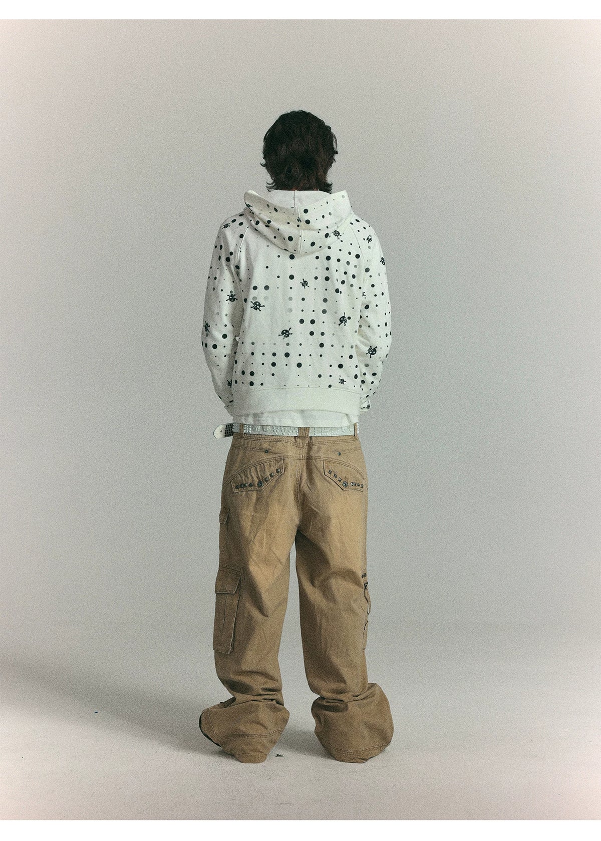 Black polka dot zip hoodie back on model
