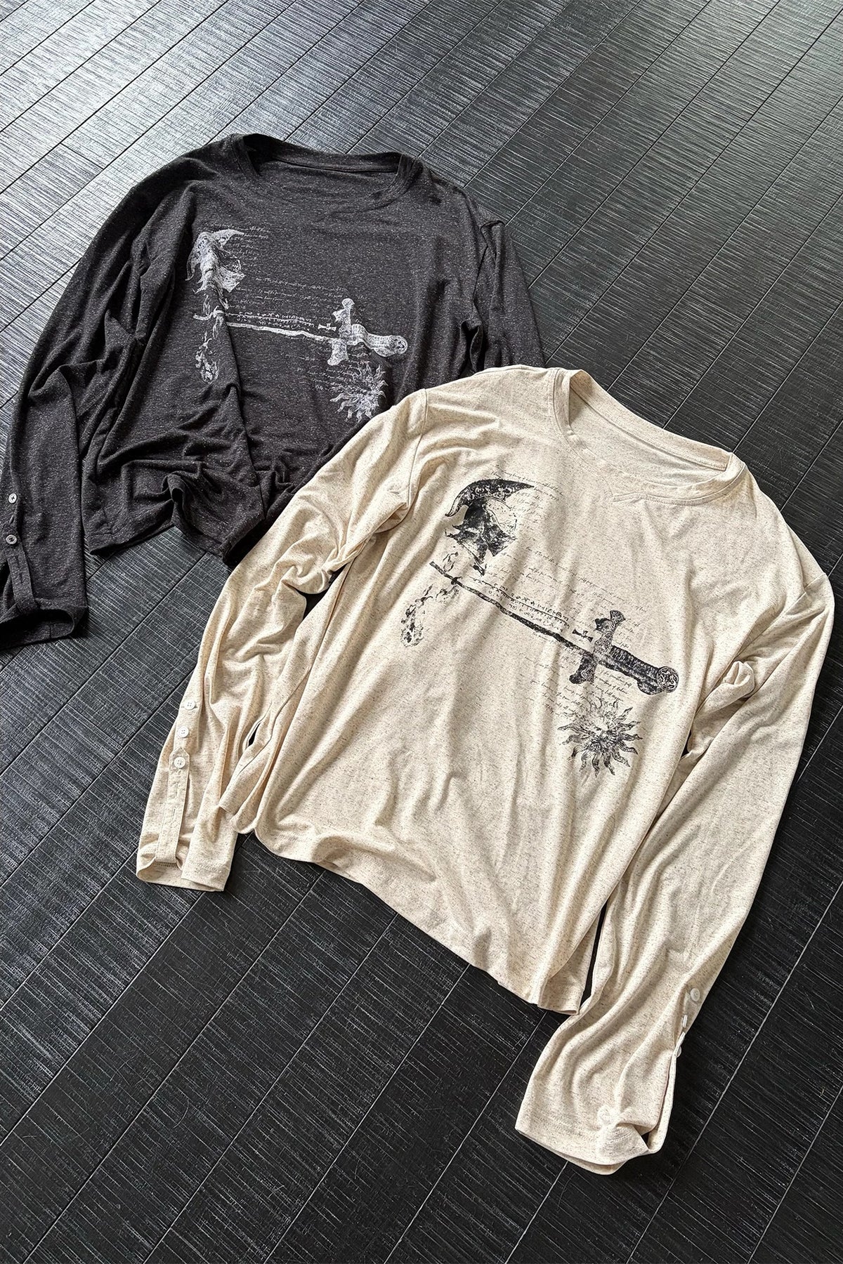 WANNA LAB Odyssey Knight Sword Print Linen Blend Roll-Up Sleeve Tee - Black and Apricot flat lay