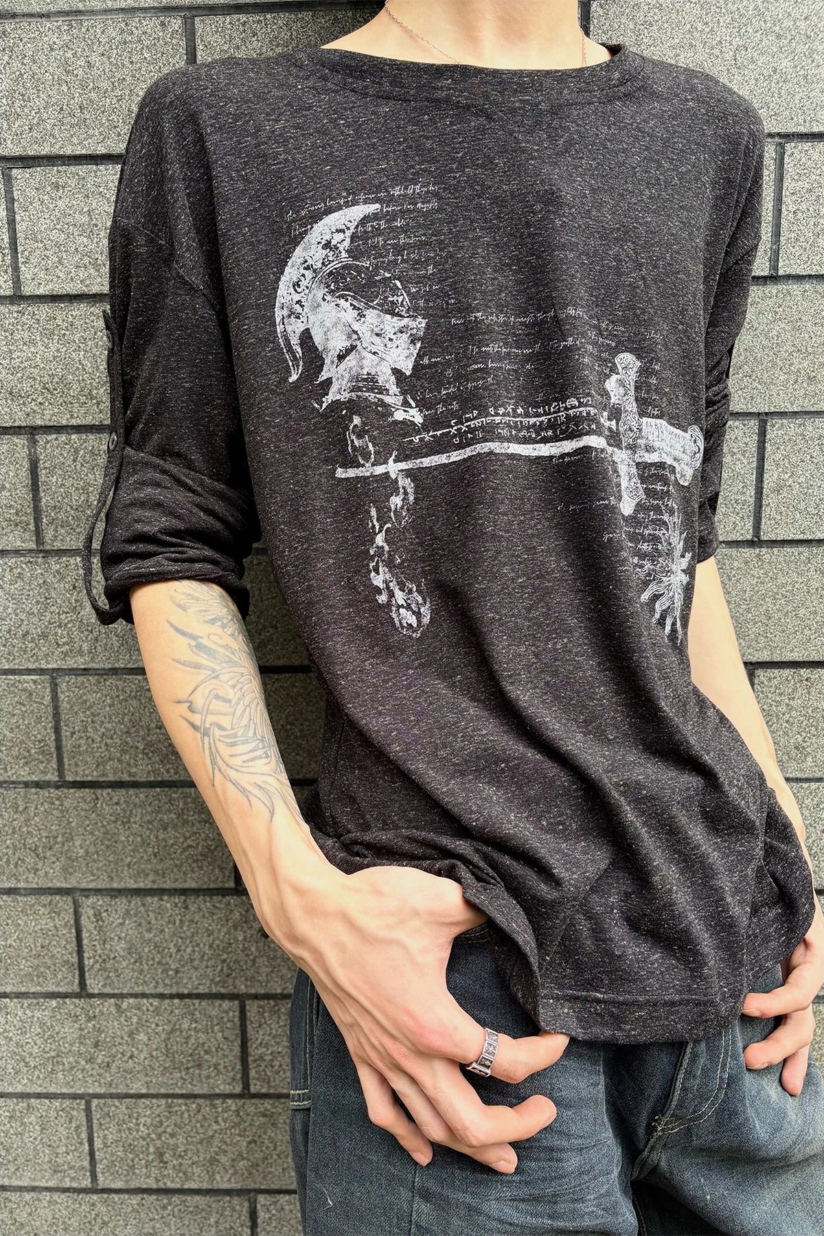 WANNA LAB Odyssey Knight Sword Print Linen Blend Roll-Up Sleeve Tee - Black front on model with sleeves rolled up