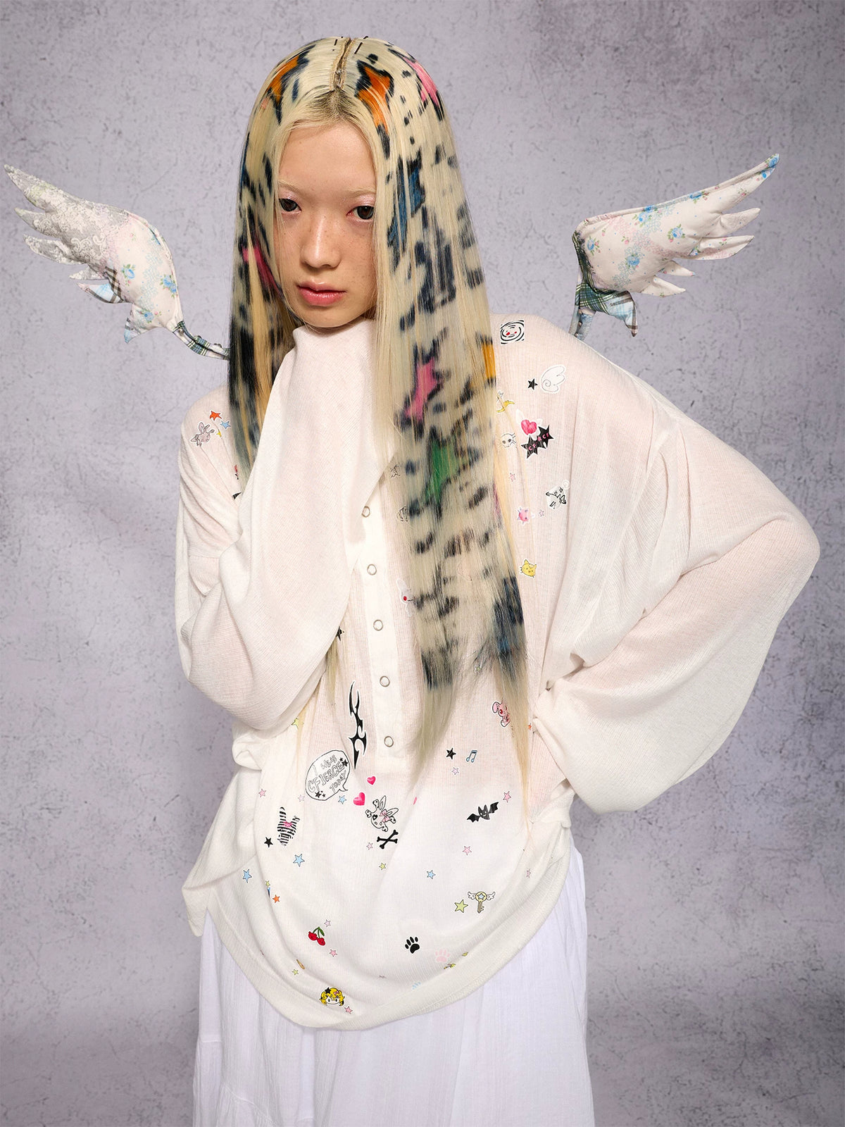 CFIERCE Sticker Print Long Sleeve Top - white top worn close with scarf