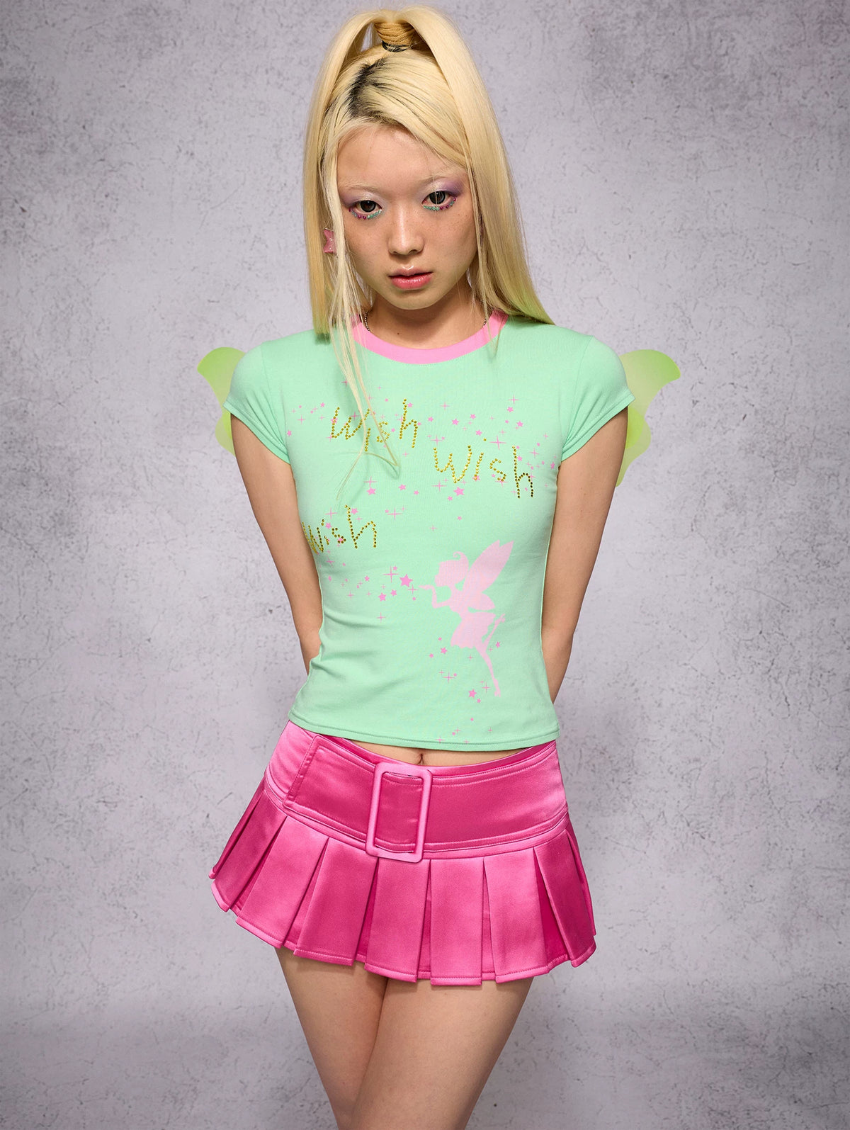 CFIERCE Satin Pleated Mini Skort - pink pleated skort worn front closer view