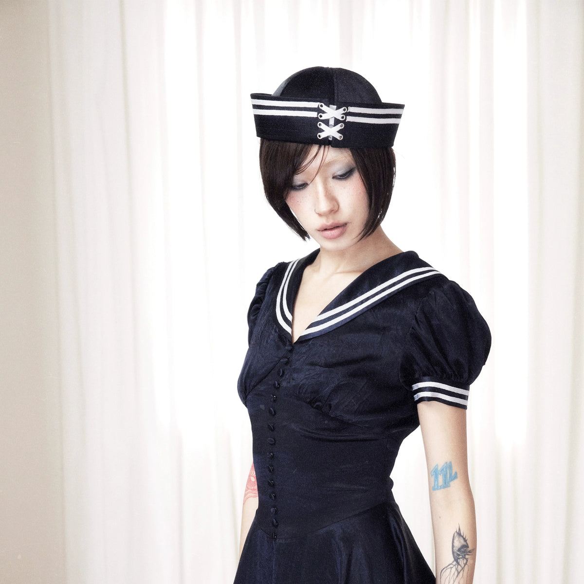 BeatleLady Satin Lace-Up Sailor Hat - Navy modeled side