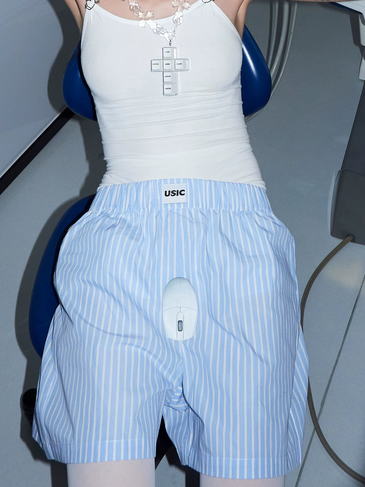 USIC sky blue striped shorts, close front fit on model
