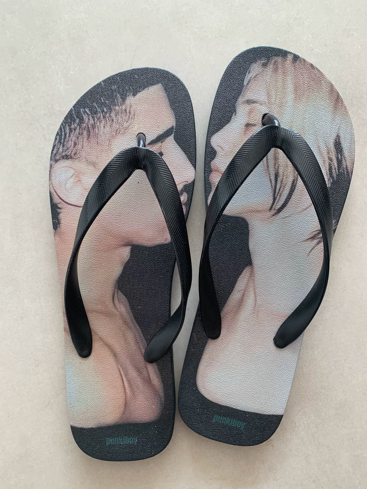 punkiboy Face-to-Face Graphic Flip-Flops - pair on light ground