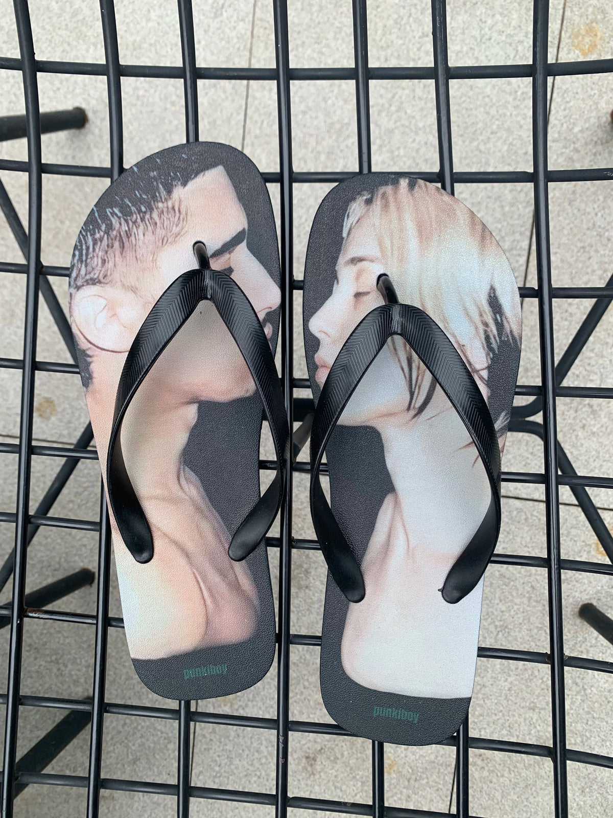 punkiboy Face-to-Face Graphic Flip-Flops - pair on metal grid