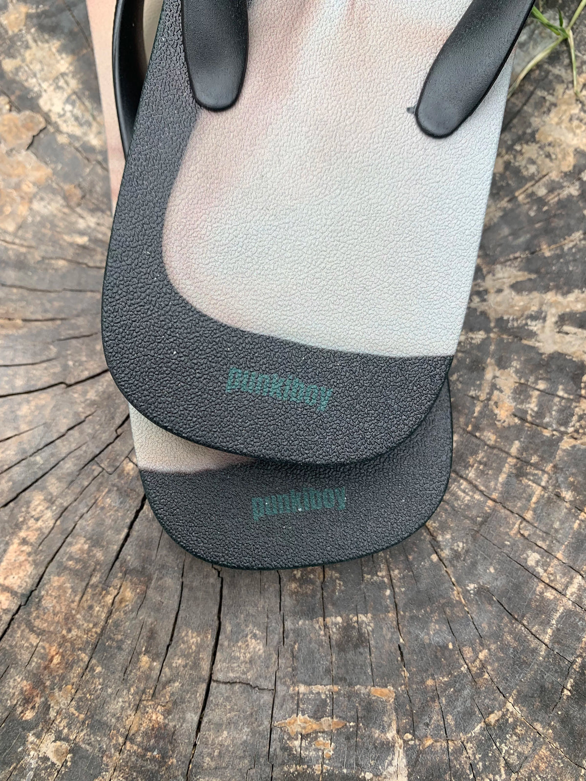 punkiboy Face-to-Face Graphic Flip-Flops - footbed texture and branding detail