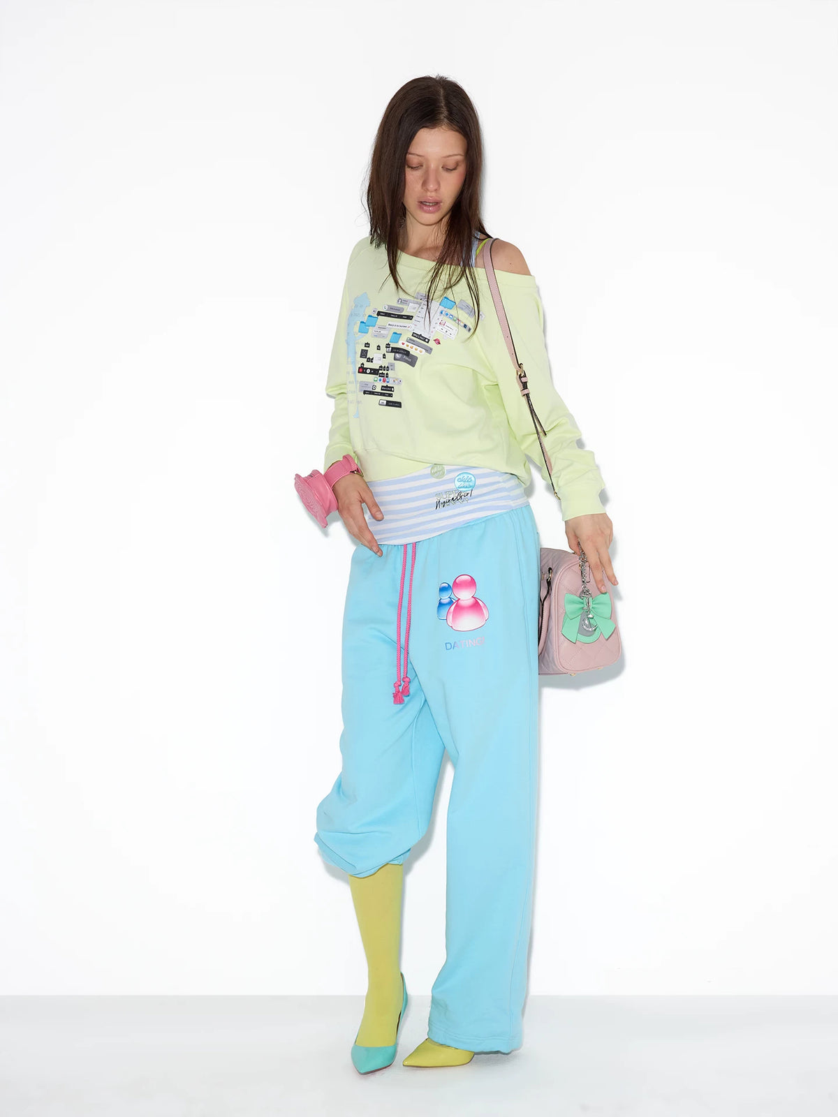 NORGIRA IT ANGEL Lime Graphic Sweatshirt and Striped Tank Set on model
