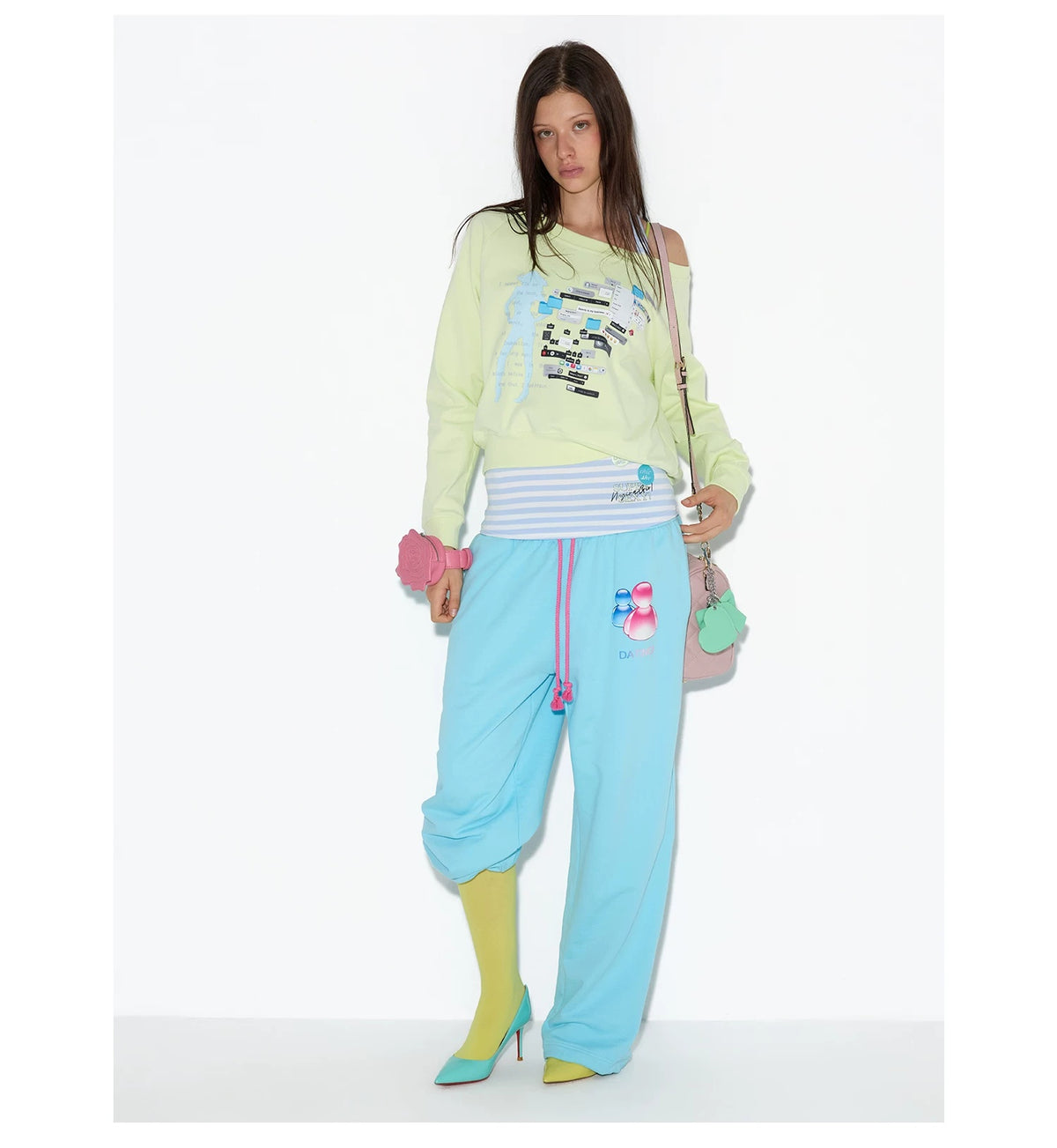 NORGIRA IT ANGEL Lime Graphic Sweatshirt and Striped Tank Set on model
