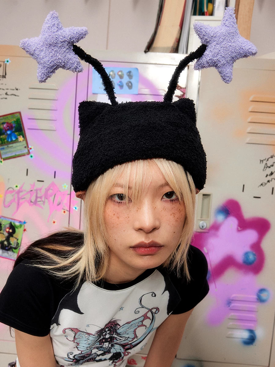 CFIERCE Star Antenna Plush Beanie - black star antenna beanie close-up on model