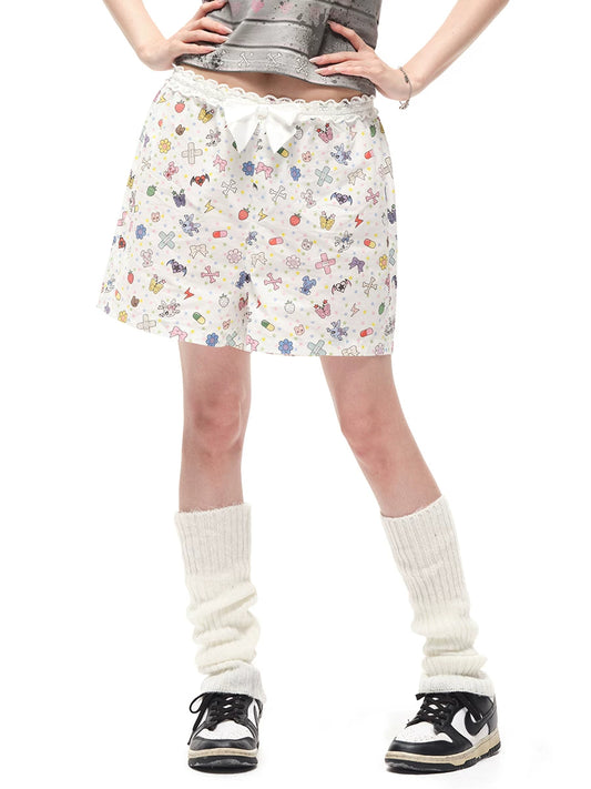 CFIERCE Sticker-Doodle Bow-Waist Shorts - sticker-print shorts worn on model against white background