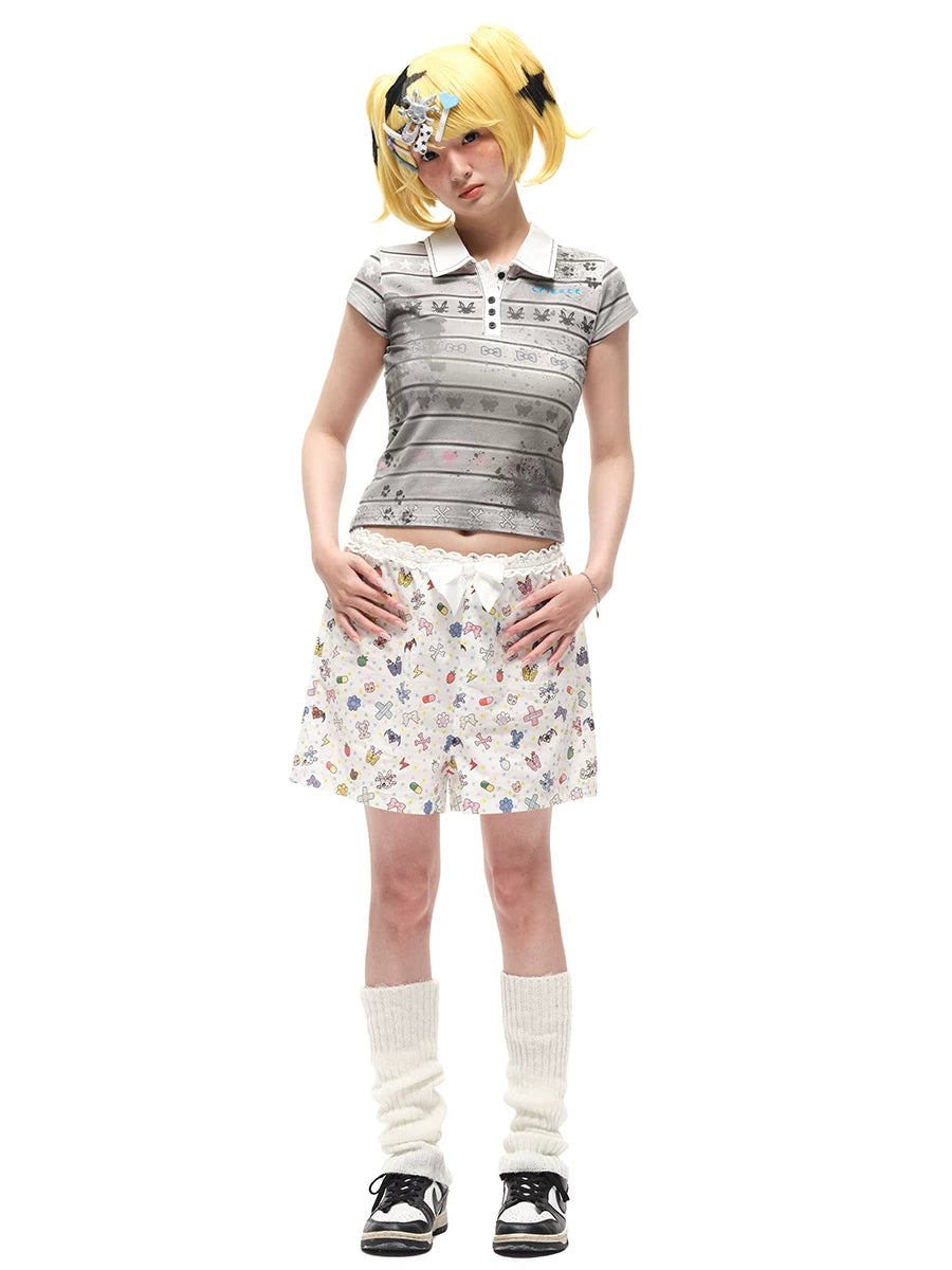 CFIERCE Sticker-Doodle Bow-Waist Shorts - sticker-print shorts styled on model, full view