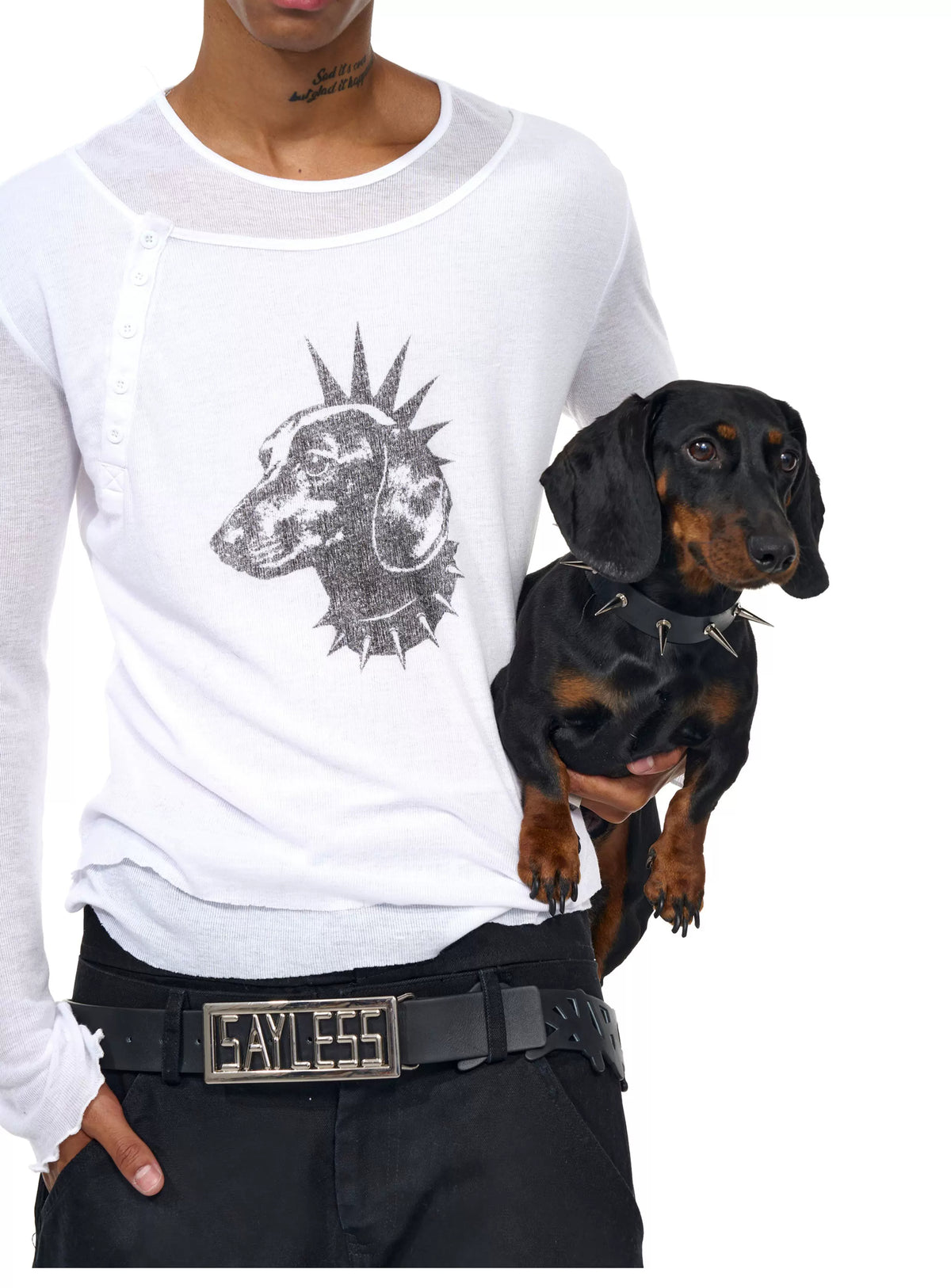 Close view of white tee dog print and layered neckline