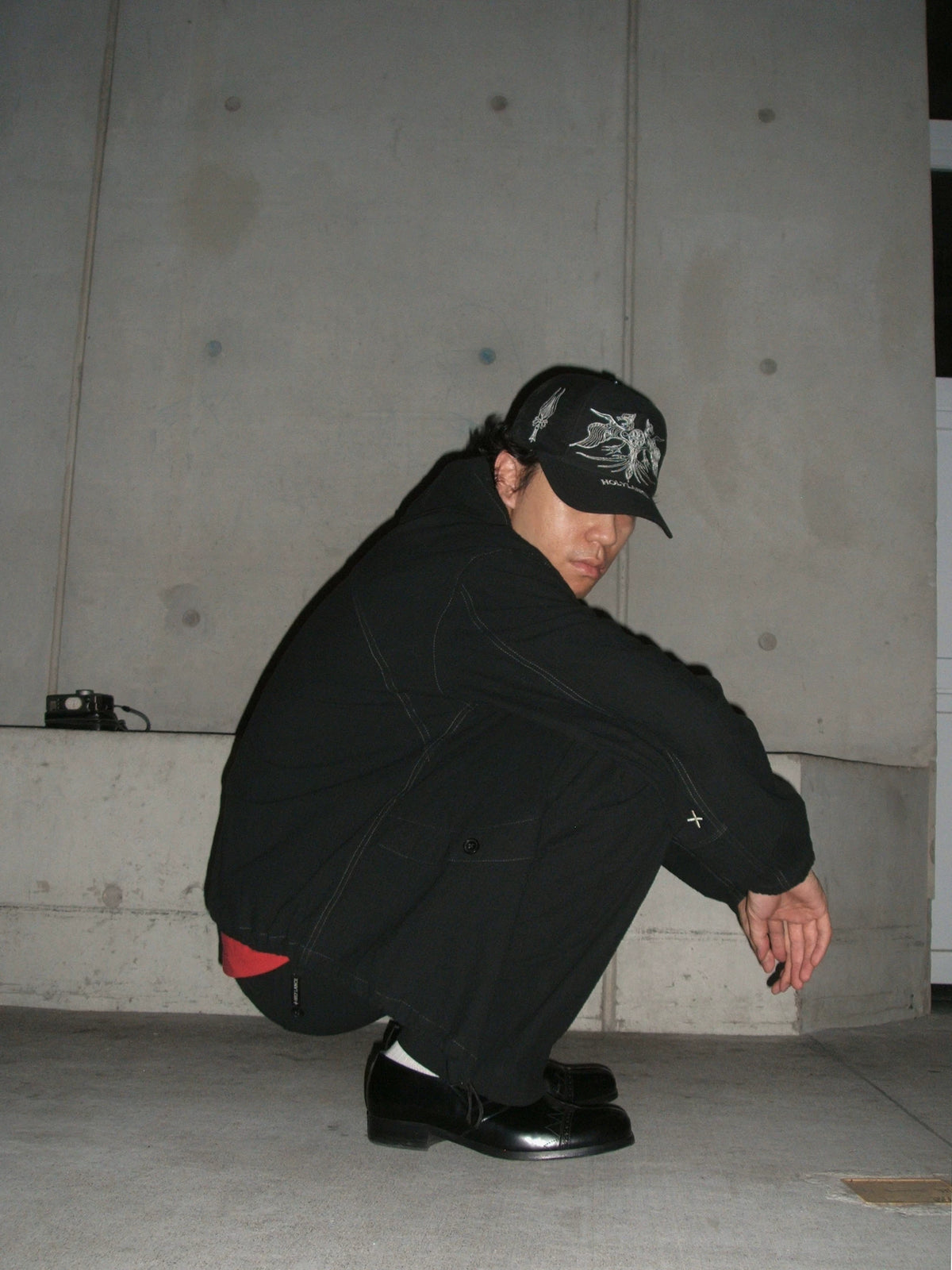 LANCER HOLYLANCE Broken Eagle Embroidered Baseball Cap - Black on model