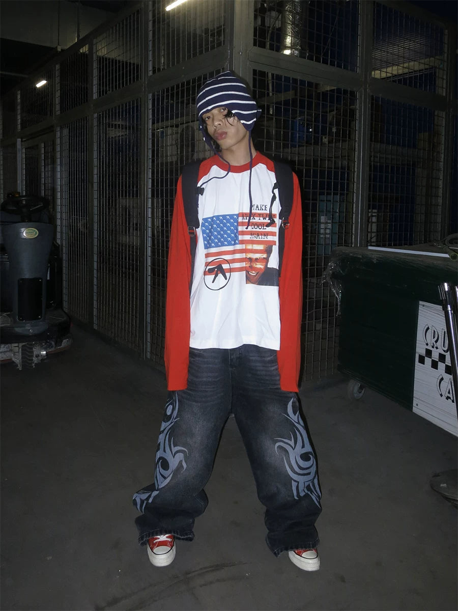 RAINMAKE Flag Parody Graphic Raglan Long Sleeve Tee - White on model