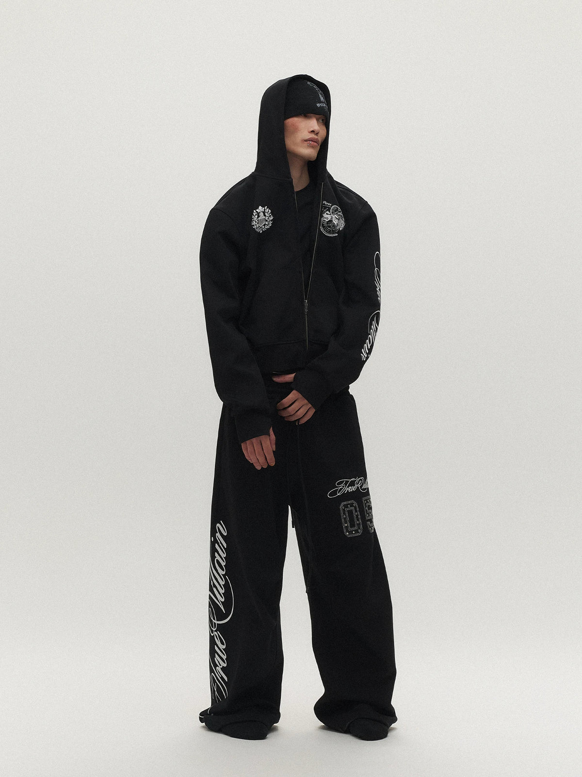 True Villain Studded Zip-Up Hoodie & Sweatpants - Black set front on model