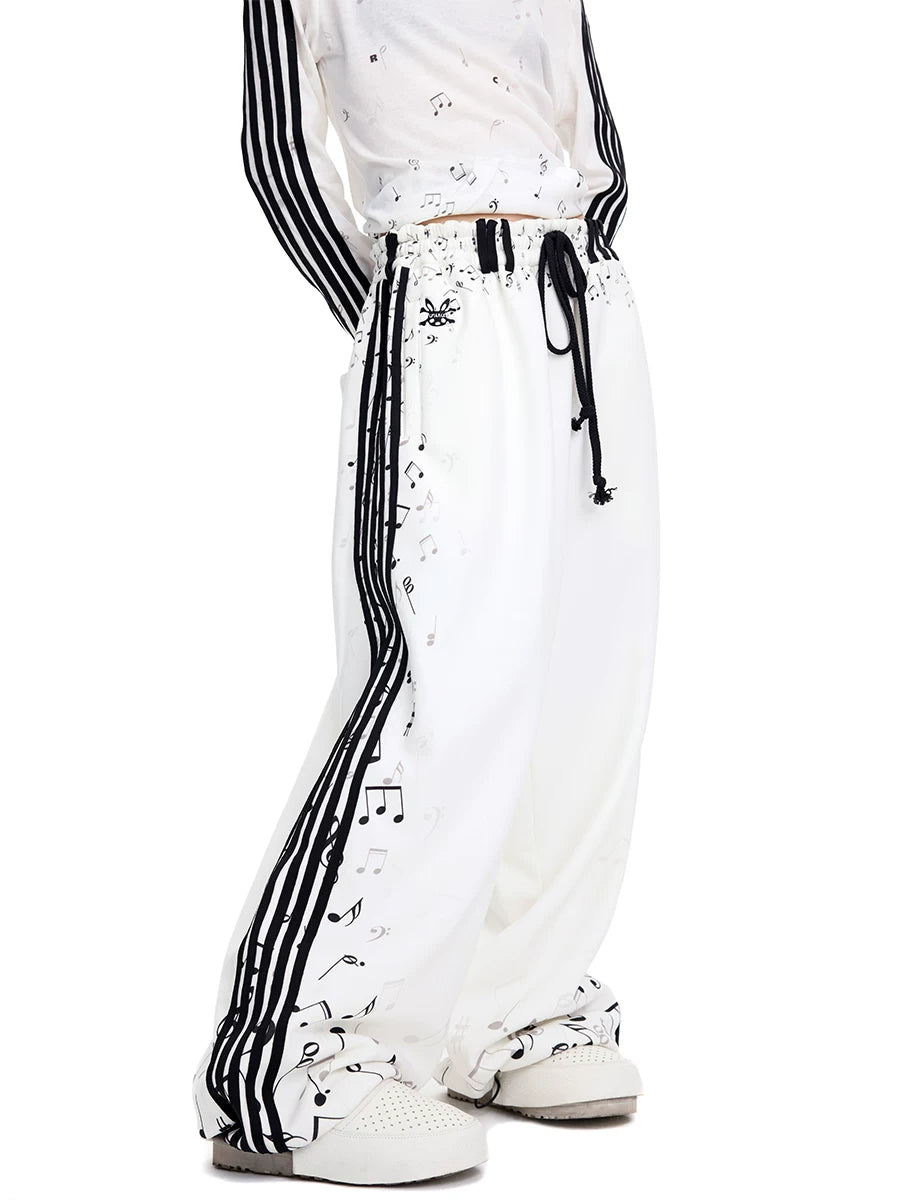 CFIERCE Music Staff Print Wide-Leg Sweatpants - white music staff sweatpants worn side close view