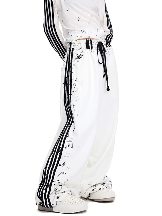 CFIERCE Music Staff Print Wide-Leg Sweatpants - white music staff sweatpants worn side close view